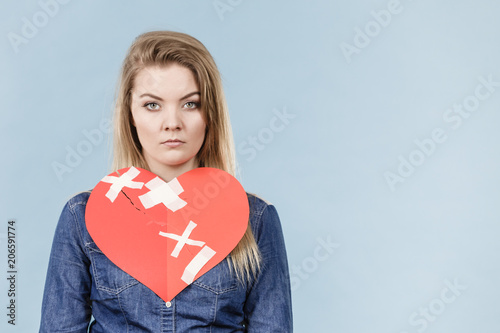 Young woman with broken heart