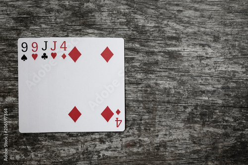poker hand: two pair. playing cards on wooden table photo