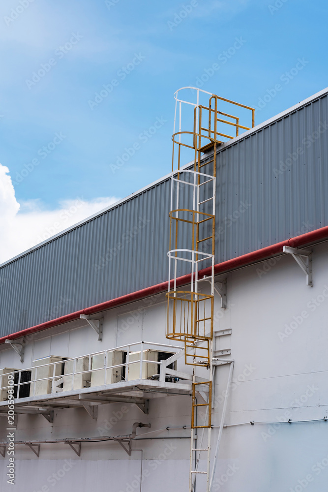 Staircase for rooftop repair and service at factory side