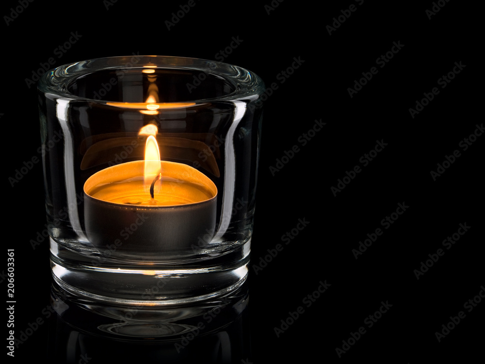 Candle in a glass candlestick Candle in a glass candlestick