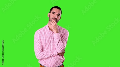 Confident young man with a gesture of doubt - Chroma background