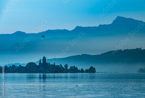 Foggy morning landscape on the shores of the Obersee (Upper Lake Zurich) , Switzerland