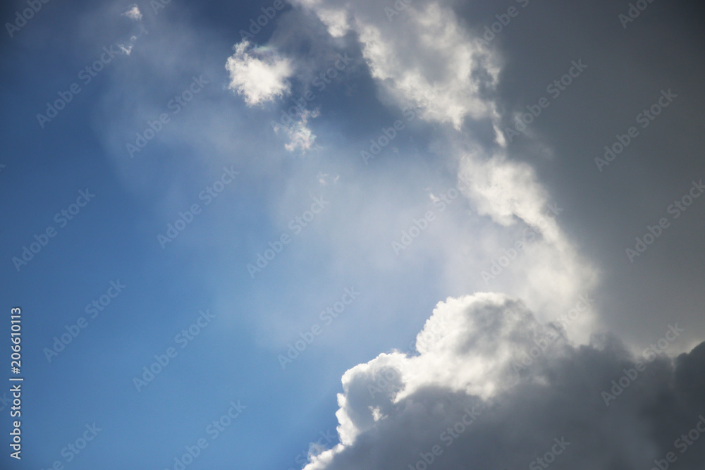 Obraz premium sun behind clouds