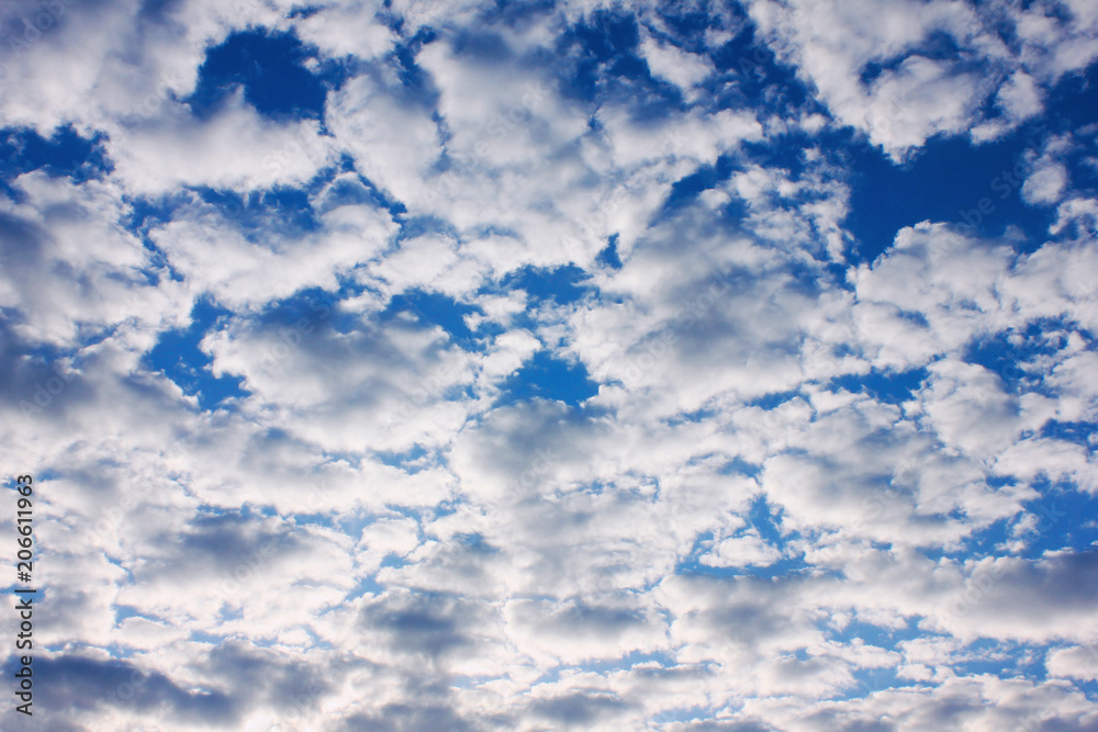 Sky with Clouds Beautiful Cloudscape Background. Vivid Blue Sky with Many  Clouds Outdoor Wallpaper, Natural Cloudscape on Sunny Day before Sunset.  Cloudy Sky Pattern, Air and Atmosphere Image. Stock Photo | Adobe