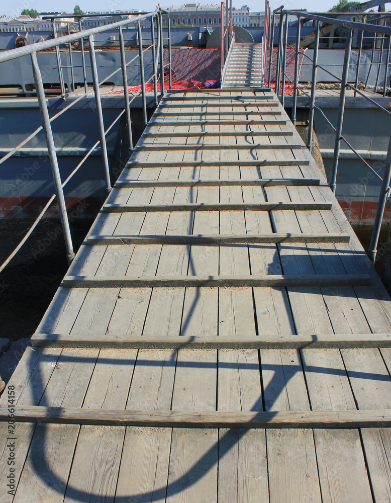 Wooden Ladder Leading to Cruise Ship Deck. Boarding Steps Entrance Platform  at Sea Port Dock Close Up View. Small Nautical Maritime Wood Ladder with  Railings for People to Board the Boats. Photos
