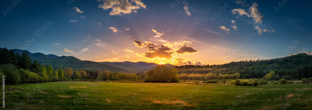 Panoramic sunset on the High Peaks Region in the Adirondacks as seen from Keene, NY