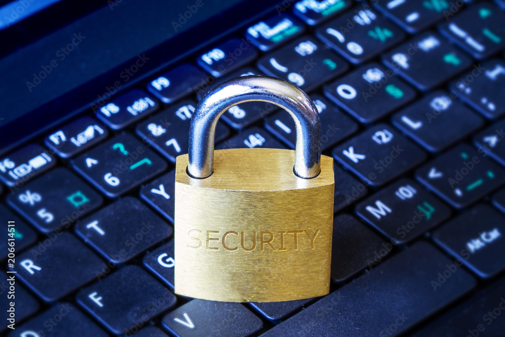 Golden Padlock on Keyboard Cyber Security Concept Golden Padlock on Keyboard Cyber Security Concept
