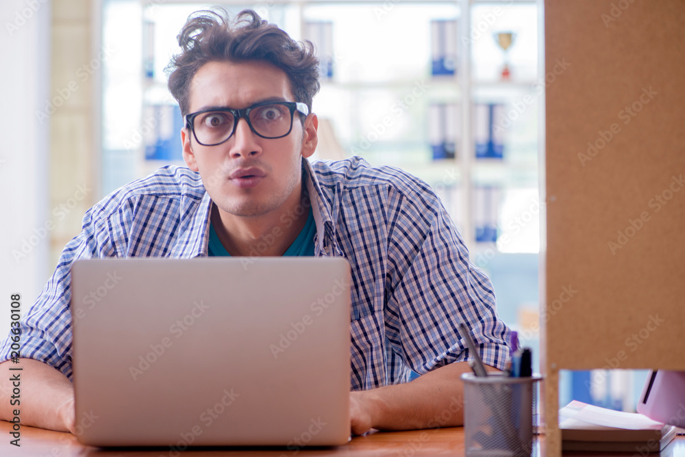 Student studying at home preparing for exam Student studying at home preparing for exam