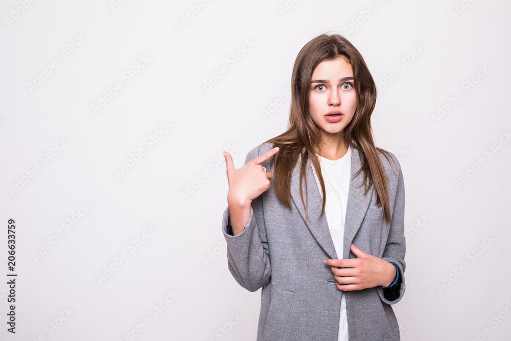 Young casual woman pointing at herself cheering happy isolated on white background Young casual woman pointing at herself cheering happy isolated on white background