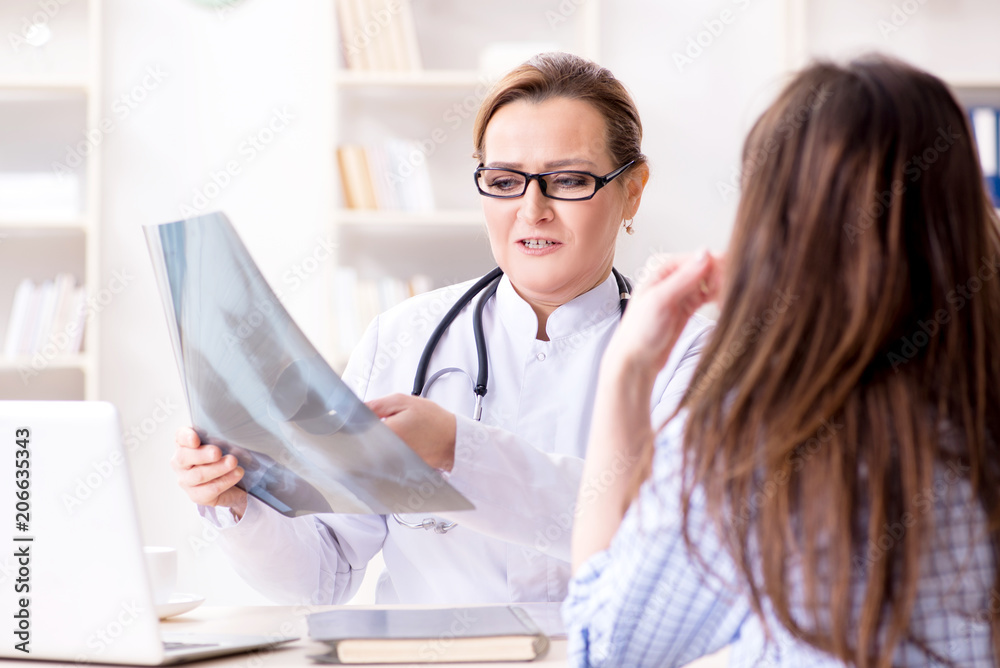 Pregnant woman visiting doctor for regular check-up Pregnant woman visiting doctor for regular check-up
