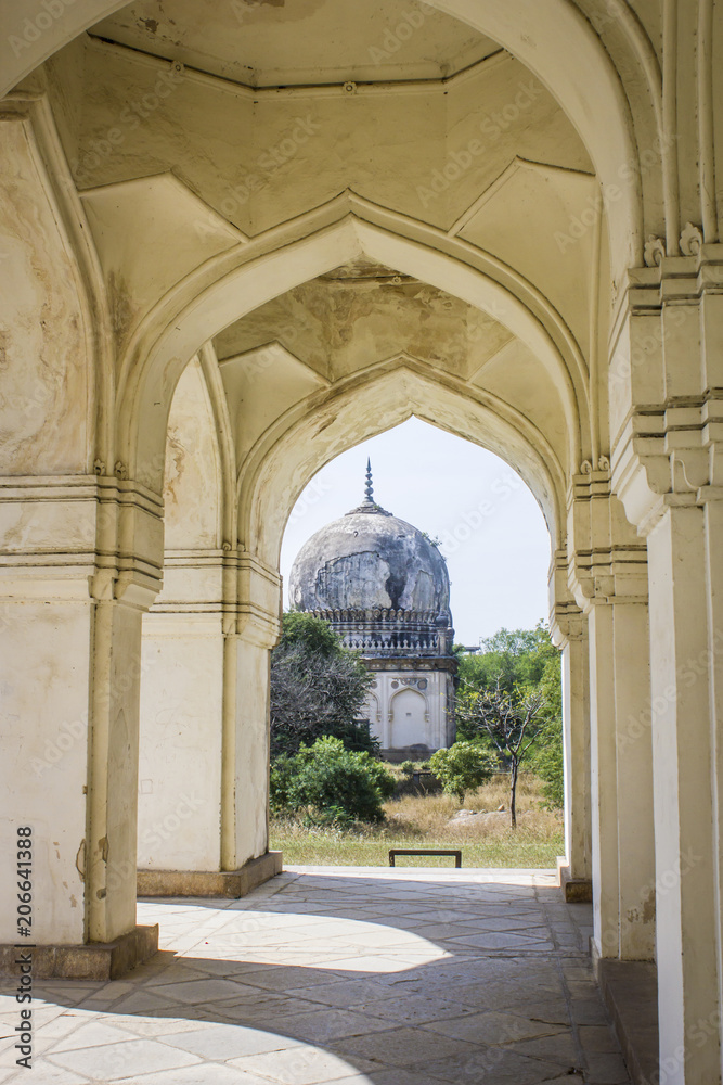 Mughal Arches Line a Hallway Leading to Another Tomb at the Qutb Shahi Tombs in Hyderabad, India