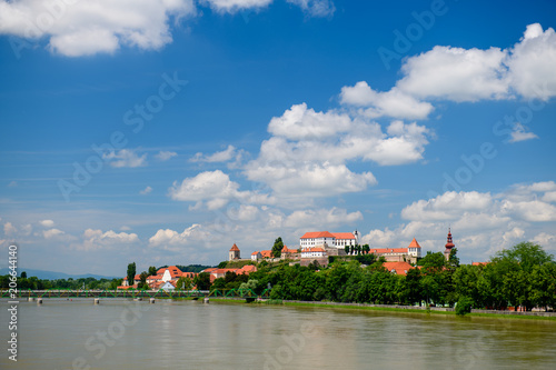 Ptuj, Slovenia, panoramic shot of oldest city in Slovenia with a castle overlooking the old town from a hill, clouds time lapse