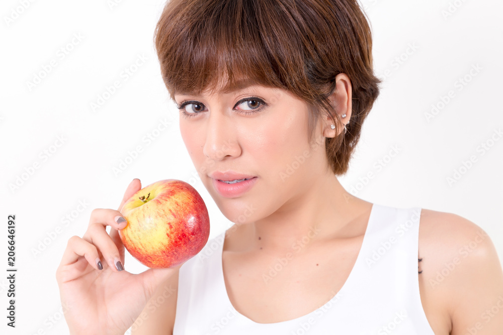 Beautifulyoung Asia woman with healthy food. Isolated on white background. Studio lighting. Concept for healthy. Beautifulyoung Asia woman with healthy food. Isolated on white background. Studio lighting. Concept for healthy.