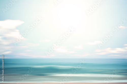 A seascape abstract beach background. panning motion blur with a long exposure, pastel colors in a vintage and retro style. © jakkapan