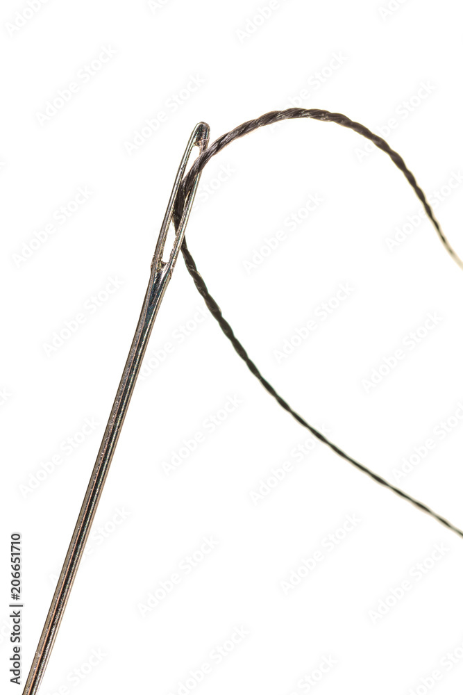 black thread in a needle black thread in a needle