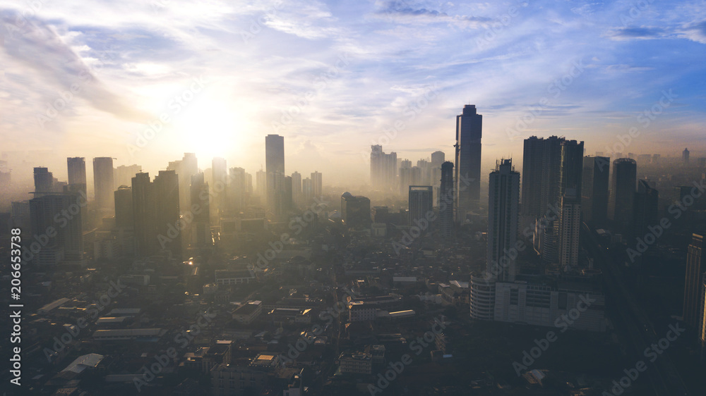 Plakat Piękny wschód słońca nad miastem Dżakarta