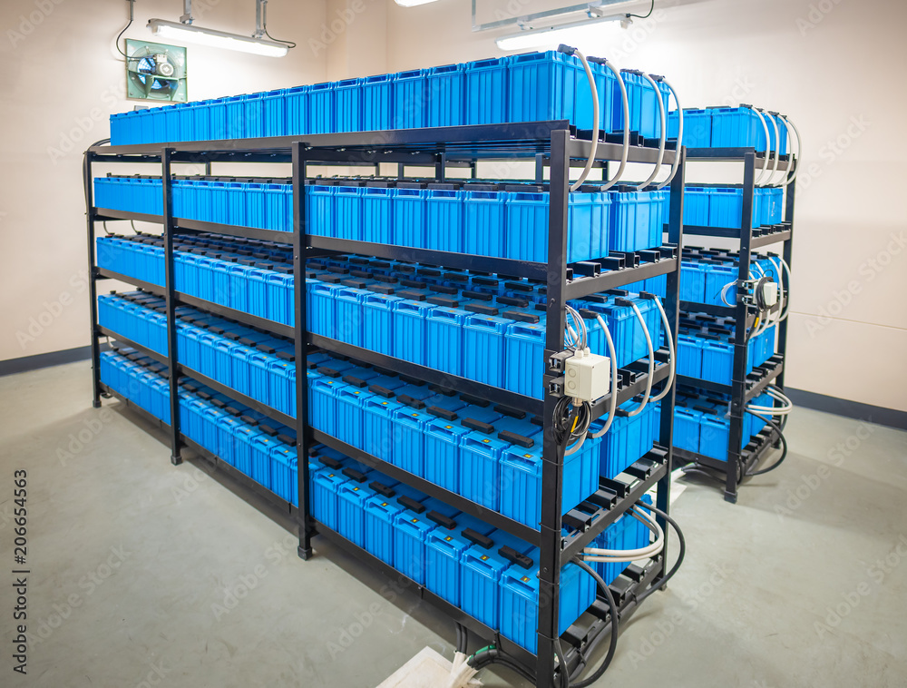Battery room,Rows of batteries in industrial backup power system. Stock Photo Adobe Stock