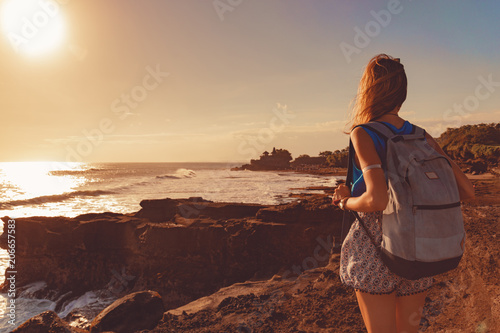 Girl enjoying sea   ocean scenery in Bali  Indonesia.