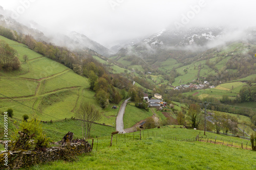 Valle de Leitariegos, in Asturias, with the summits of the mountains covered by the snow of spring photo