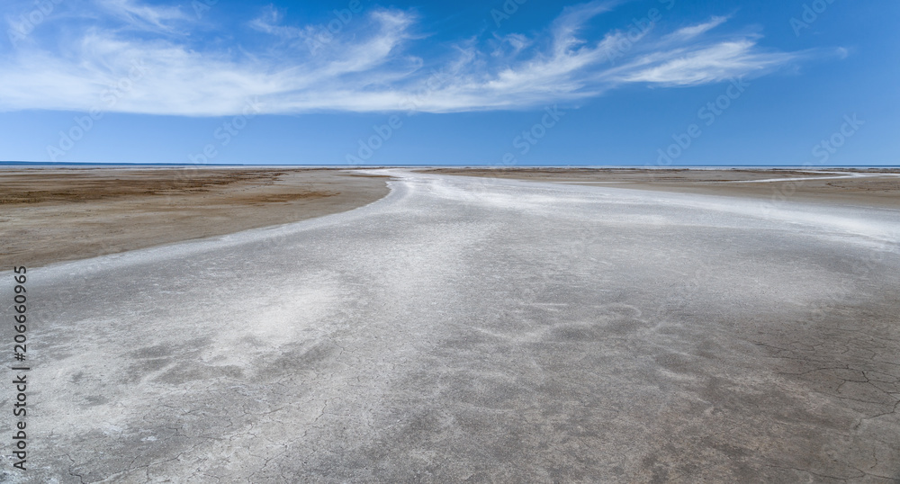 Salt dry river on the lake Elton. Landscape with salt dried-up seasonal river.