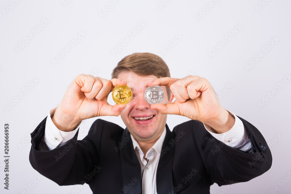 happy man play with bitcoin and fooling around happy man play with bitcoin and fooling around