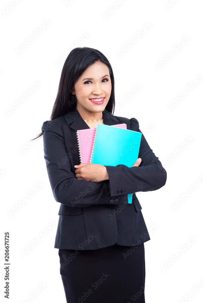 Beautiful asian woman in black suit holding notebook and smiles over white background Beautiful asian woman in black suit holding notebook and smiles over white background