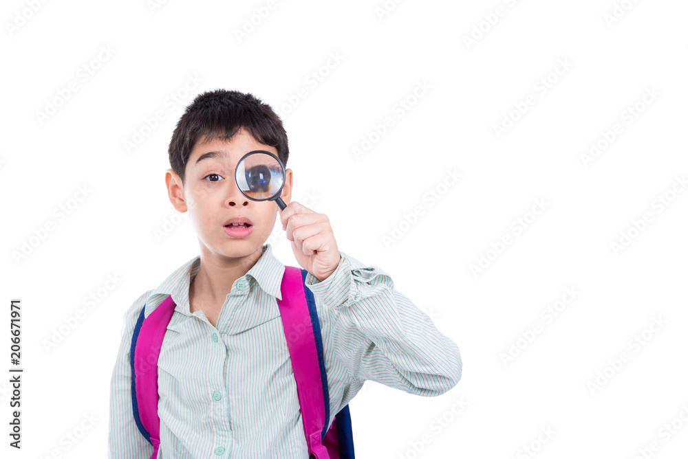 Young asian boy looking thru magnifying glass over white background Young asian boy looking thru magnifying glass over white background