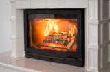 Tiled stove, fireplace. White tiles closeup
