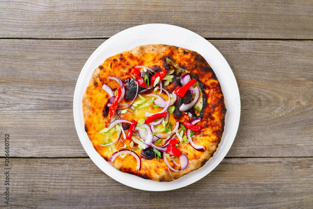 Traditional Italian focaccia with onion and bell pepper, homemade flat bread. Homemade family cooking, tasty appetizer flat lay at old table