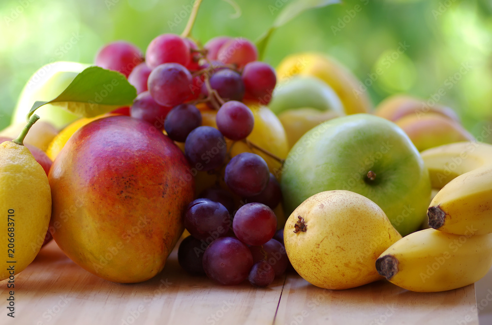 exotic fruit on table, green background exotic fruit on table, green background