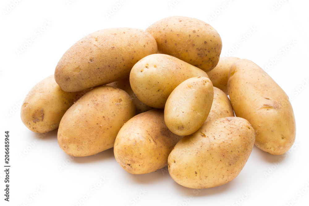 New potato isolated on the white background. New potato isolated on the white background.