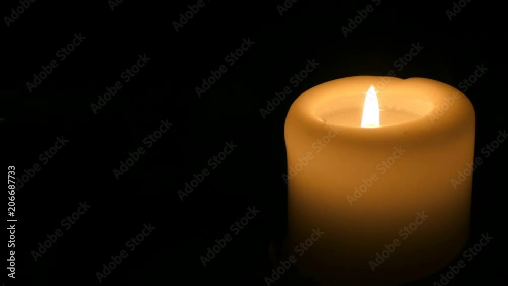 Candle in the dark lit Candle in the dark lit