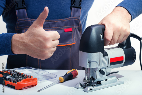 Wallpaper Mural Professional technician working in repair service. Repairing power tools. Torontodigital.ca