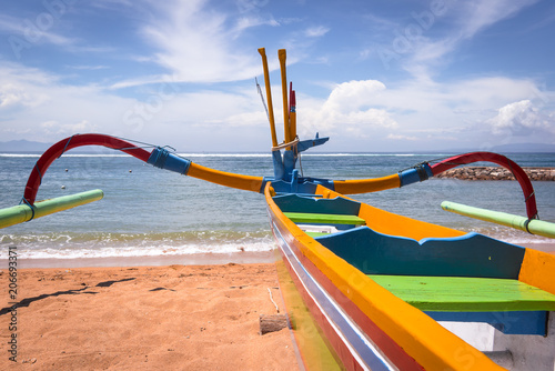 boat with strong colors on a balinese beach