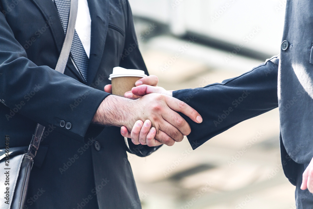 Success of handshake business partners.Partnership approval and thanks gesture concept