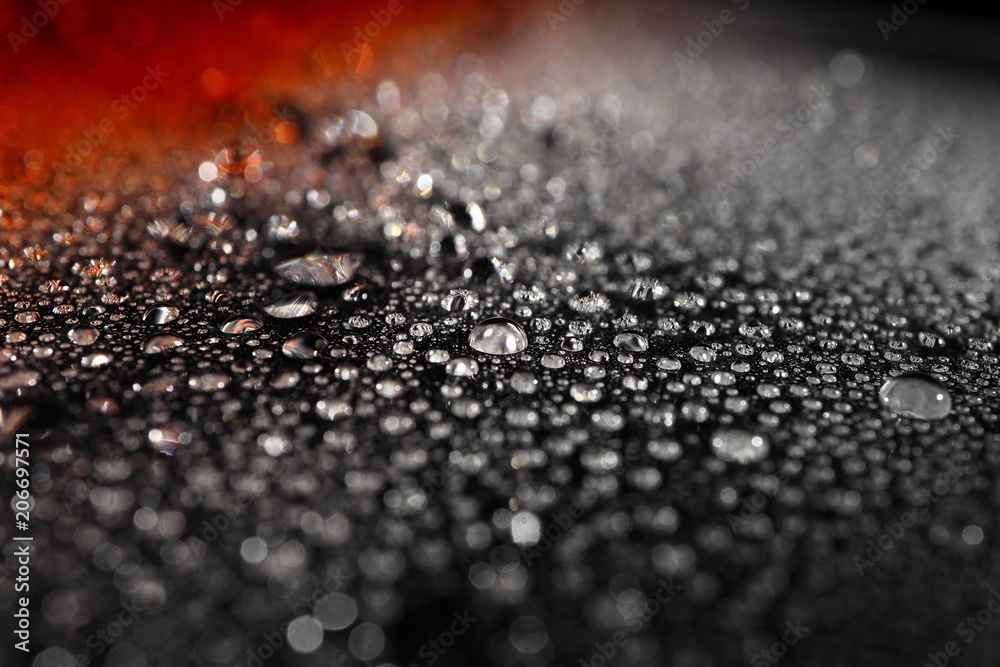 liquid droplets on a transparent surface