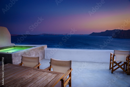 Oia,Santorini, Greece, May 2018  Terrace view in Oia village on Santorini island, Greece © offcaania