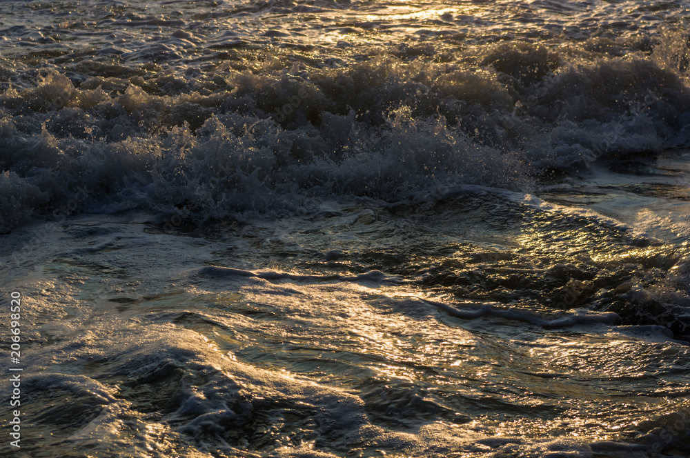 Obraz premium Amazing sea sunset, the sun, waves, clouds
