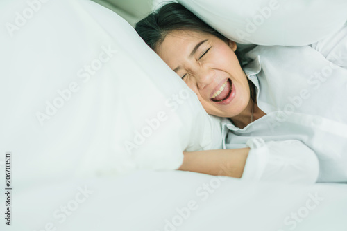 angry japanese woman mad at pillow with emotion and violence anger management concept