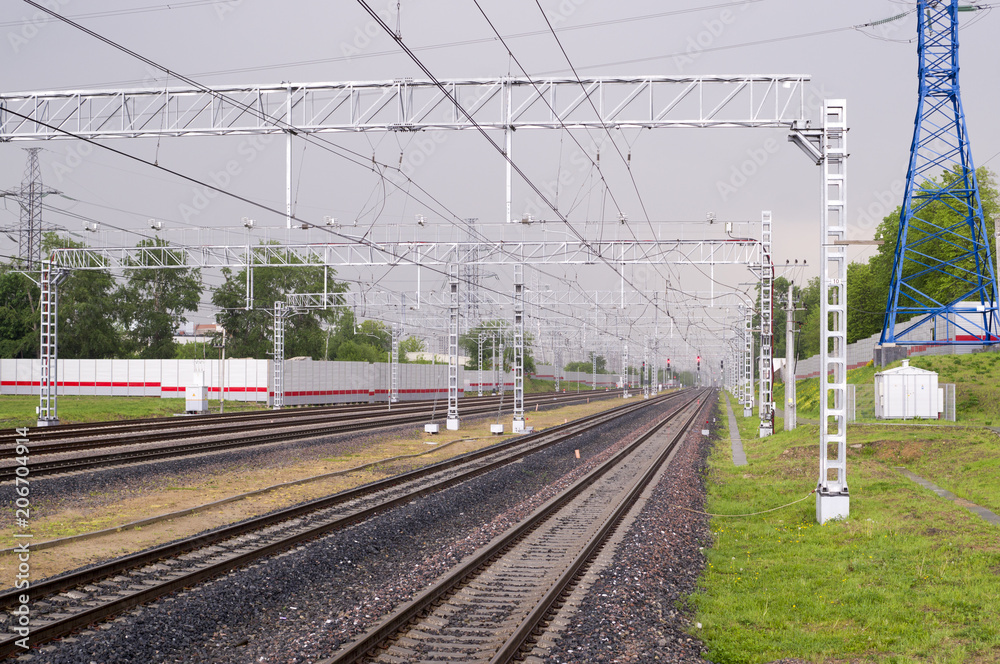 railroad in spring rainy day, viev from station. background, transportation