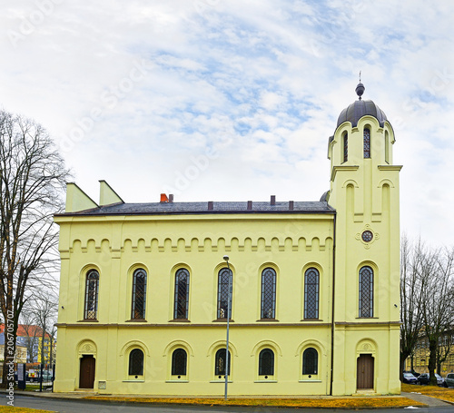 The Krnov Synagogue also called the temple, was built in 1871. The exterior of the building with twin towers and round-arched windows is in an eclectic, round-arched, Rundbogenstil neo-romantic style photo