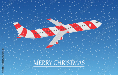 Airplane in the sky with snowflakes. Merry Christmas.