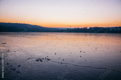 Dusk over a frozen lake in Chisinau