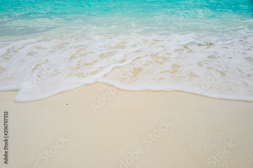 Summer concept , Beach white sand and turquoise sea color at maldives on the weekend holidays