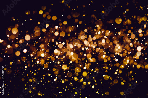 Christmas blur bokeh background texture abstract light glittering stars on bokeh. glitter vintage lights background