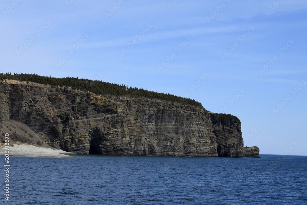 coastline of Bell Island seen from the ocean, Avalon region Newfoundland, Canada