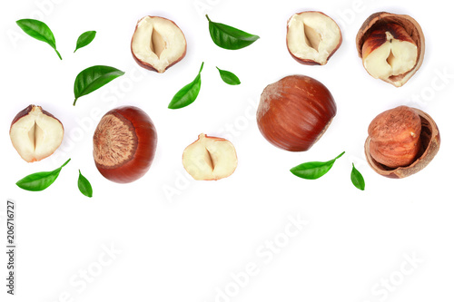 Hazelnuts with leaves with copy space for your text isolated on white background. Top view. Flat lay