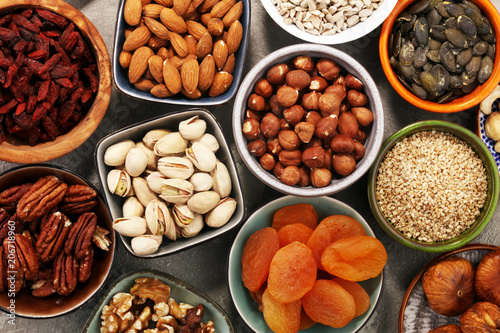 Fototapeta Naklejka Na Ścianę i Meble -  Composition with dried fruits and assorted healthy nuts