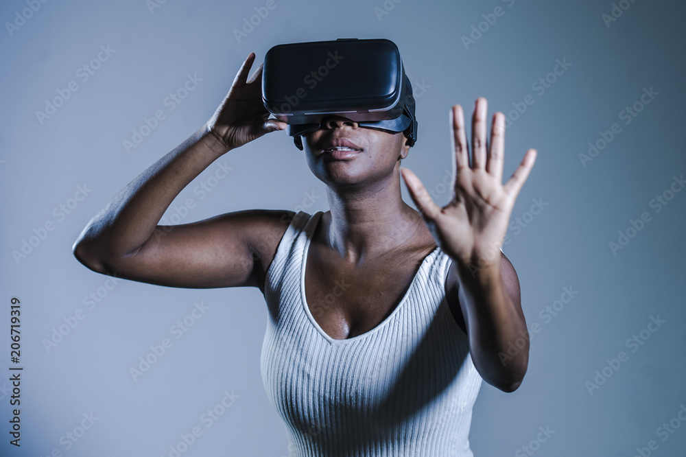 attractive curious black afro american woman wearing VR 3d visio attractive curious black afro american woman wearing VR 3d visio