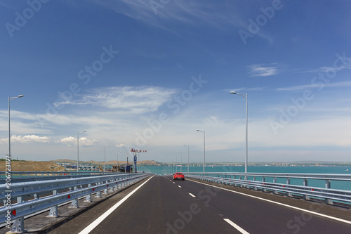 Cars go on the Crimean bridge across the Kerch Strait